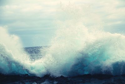 Waves splashing on rocks