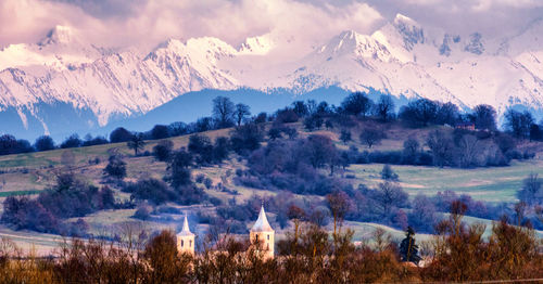 Scenic view of snowcapped mountains against sky