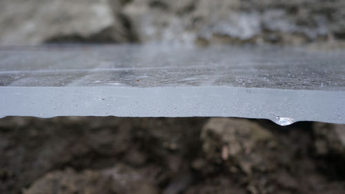 Close-up of wet metal during winter