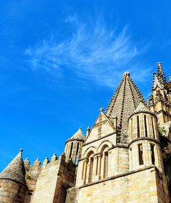 Low angle view of building against blue sky