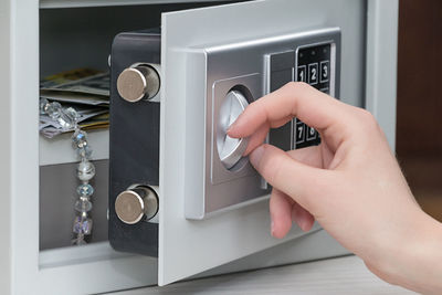 Close-up of human hand at home
