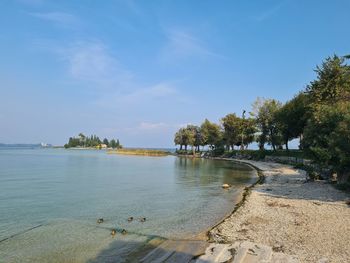 Scenic view of river against sky