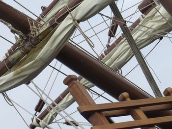 Low angle view of ferris wheel against sky