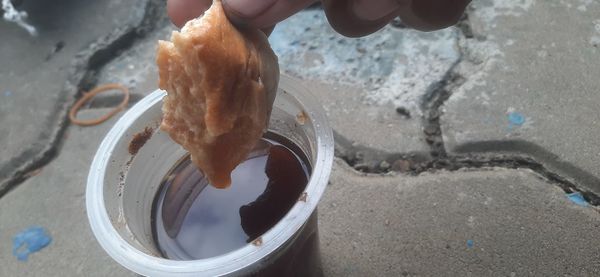 Midsection of person preparing food