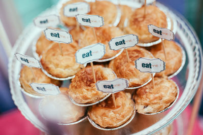 Eat me text on cupcakes