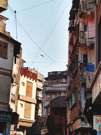 Low angle view of buildings against clear sky