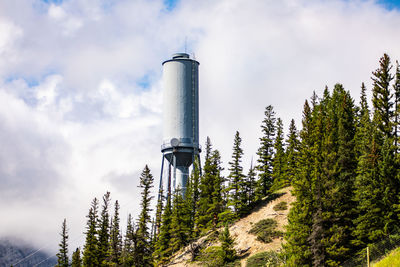 Low angle view of smoke stack against sky