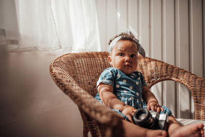 Portrait of cute baby girl at home