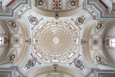 Low angle view of ornate ceiling in building