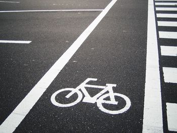 High angle view of bicycle sign on road