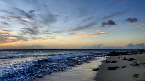 Scenic view of sea at sunset