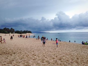 Tourists enjoying at beach