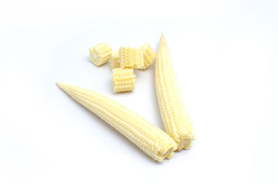 High angle view of bread in container against white background