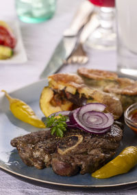 Close-up of food served on table