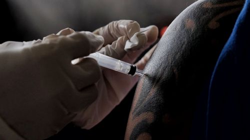 Cropped hand of doctor examining patient