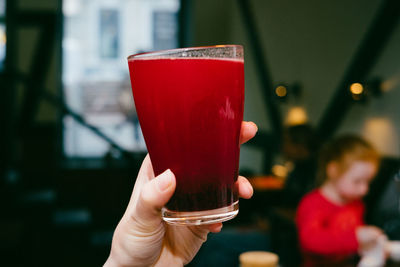 Close-up of hand holding drink