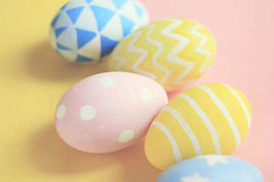 High angle view of multi colored easter eggs on table