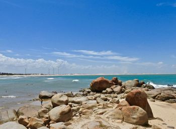 Scenic view of sea against blue sky