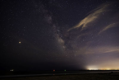 Scenic view of star field against sky at night