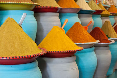 Multi colored umbrellas for sale at market stall