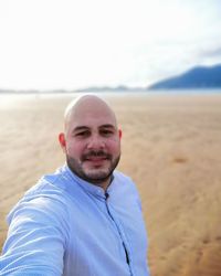 Portrait of young man on beach