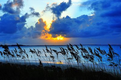 Scenic view of sea against sky during sunset