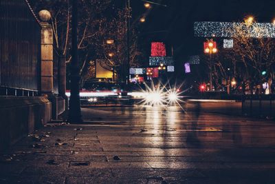 Illuminated street at night