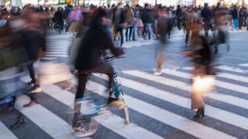 People walking on city street