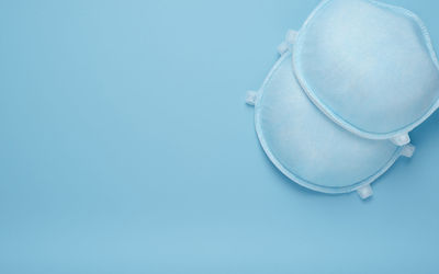 High angle view of blue container on table