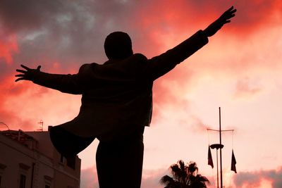 Silhouette of man statue