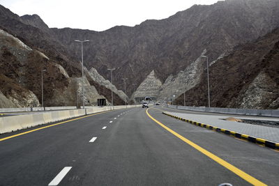 Road leading towards mountains