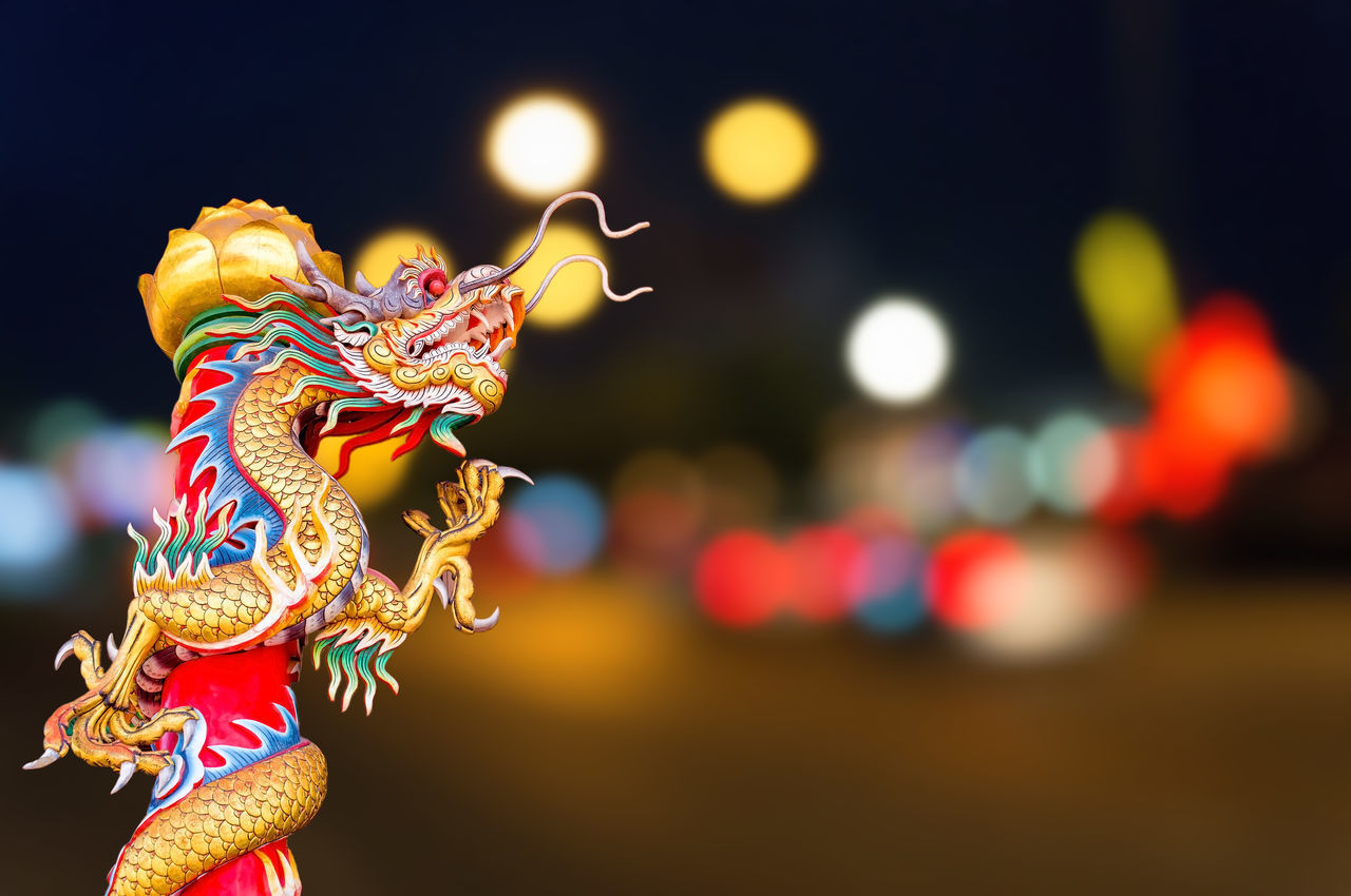 Dragon; golden; china; temple; chinese; background; statue; art; symbol; travel; blue; decorative; animal; architecture; ornament; traditional; gold; culture; power; ancient; asian; asia; religion; tradition; fire; oriental; religious; sculpture; sky; whi