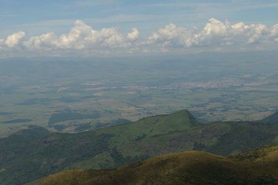 Aerial view of landscape against sky in city