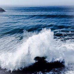 Waves splashing on rocks