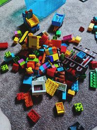 High angle view of toys on carpet at home