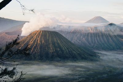 Smoke emitting from volcanic mountain