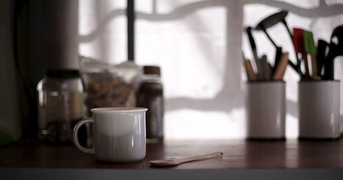 Close-up of coffee cup on table