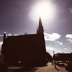 Sun shining through building