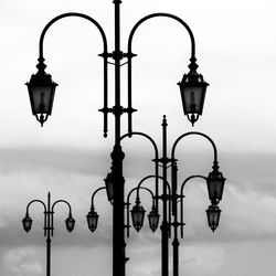 Low angle view of street light against sky