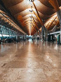 Empty illuminated corridor of building