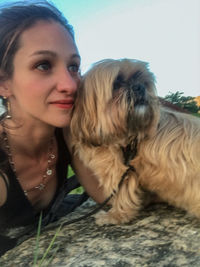 Portrait of woman with dog