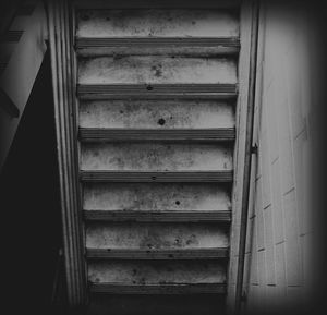 Low angle view of closed window of building