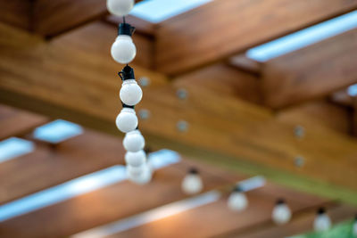 Low angle view of electric lights on table