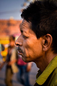 Man looking away outdoors