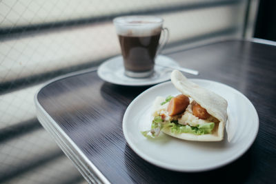 Close-up of breakfast served on table