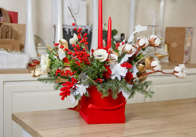 Close-up of flower pot on table at home