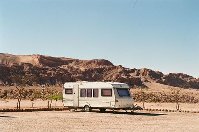 Built structure on desert against clear sky