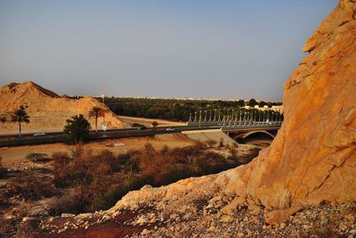 Bridge over river against clear sky