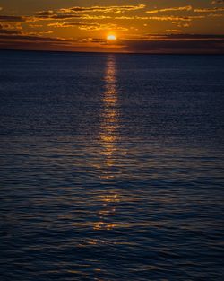 Scenic view of sunset over sea