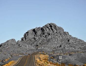 Scenic view of mountains against clear sky